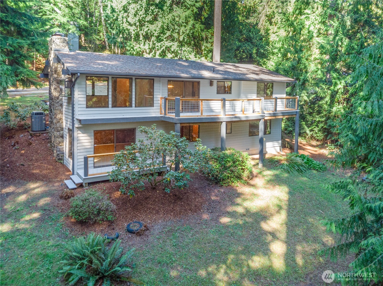 91 Drew Lane Port Ludlow, WA 98365 - Photo 4 of 38 a front view of a house