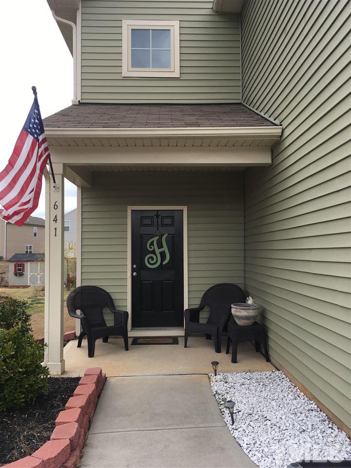 641 Hastings Road Mebane, NC 27302 - Photo 2 of 23 a view of a house with a barbeque and chair