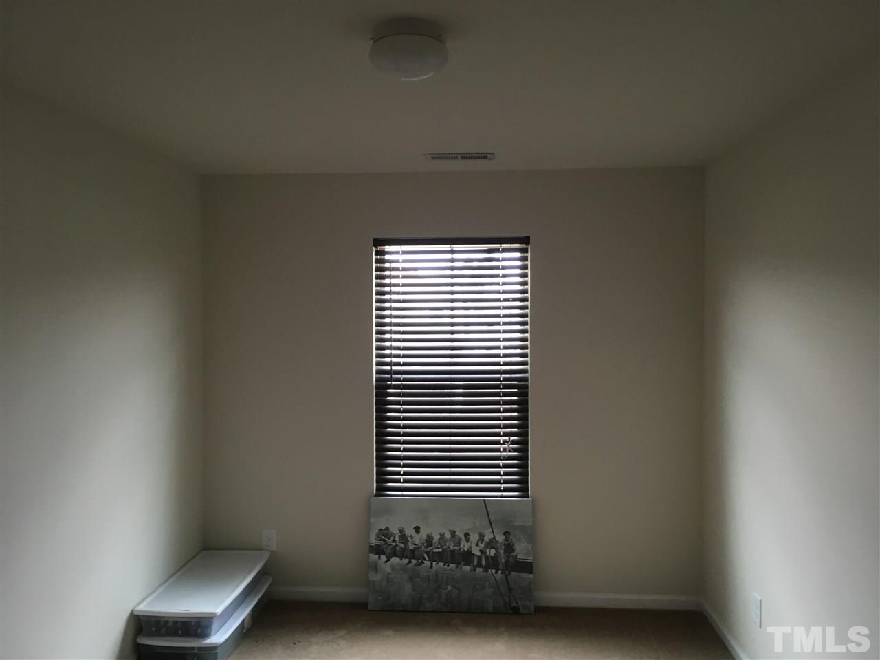 641 Hastings Road Mebane, NC 27302 - Photo 16 of 23 a view of a room with a door and a chair