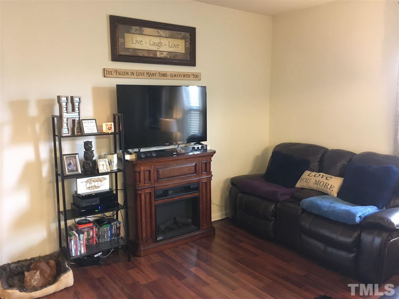 641 Hastings Road Mebane, NC 27302 - Photo 3 of 23 a living room with furniture and a flat screen tv