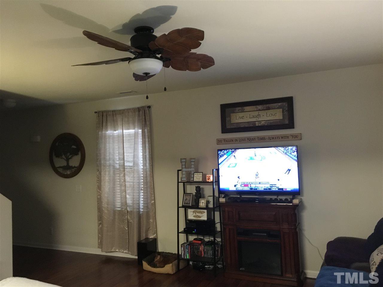 641 Hastings Road Mebane, NC 27302 - Photo 21 of 23 a living room with furniture and a fireplace