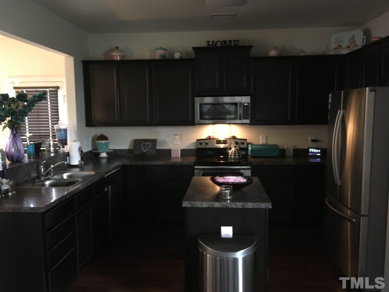641 Hastings Road Mebane, NC 27302 - Photo 6 of 23 a kitchen with a sink stove and refrigerator