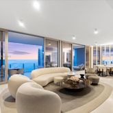 a room with furniture and a large window