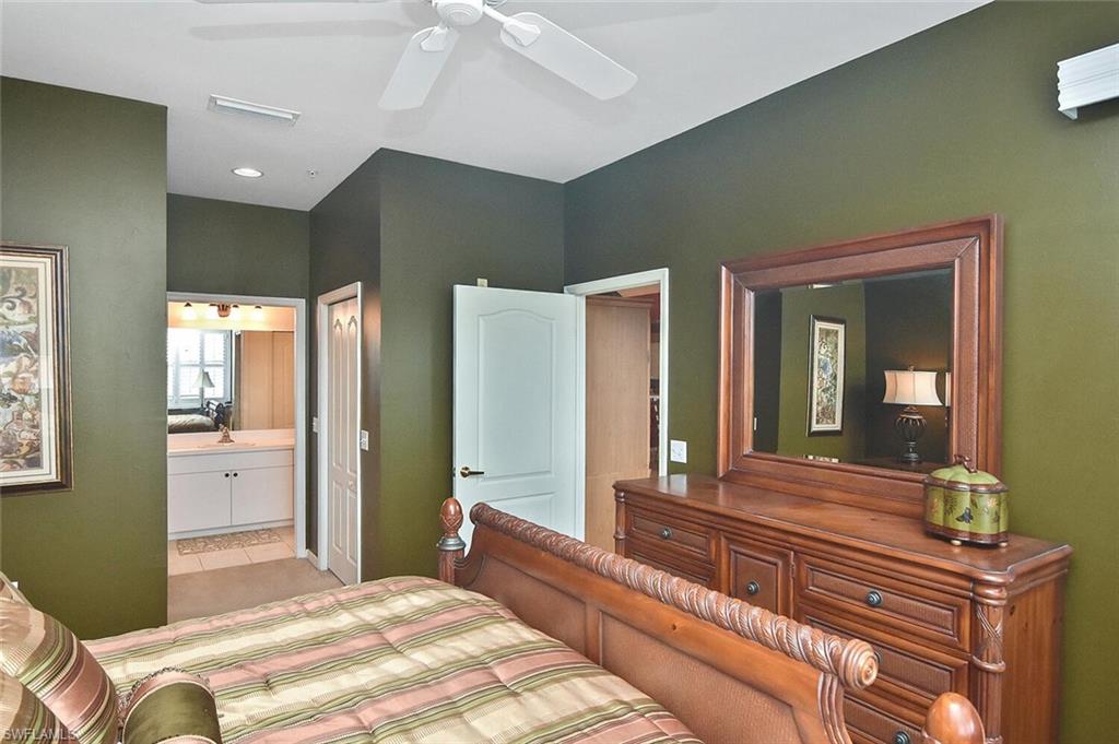 3800 Sawgrass Way, Unit 3143 Naples, FL 34112 - Photo 20 of 45 Bedroom featuring ensuite bathroom, ceiling fan, and recessed lighting