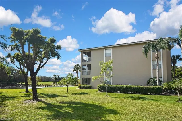 a view of a building with a big yard