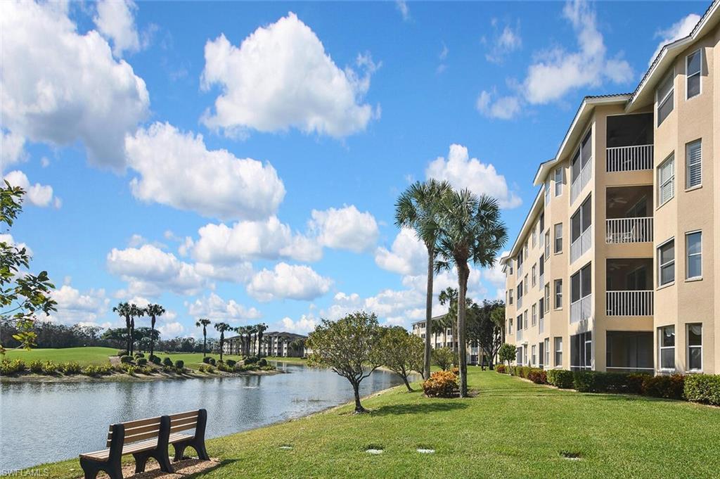 3800 Sawgrass Way, Unit 3143 Naples, FL 34112 - Photo 42 of 45 View of home's community featuring a water view and a yard