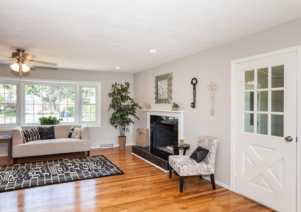 99 Sunnybrook Road Springfield, MA 01119 - Photo 12 of 30 a living room with furniture and a fireplace