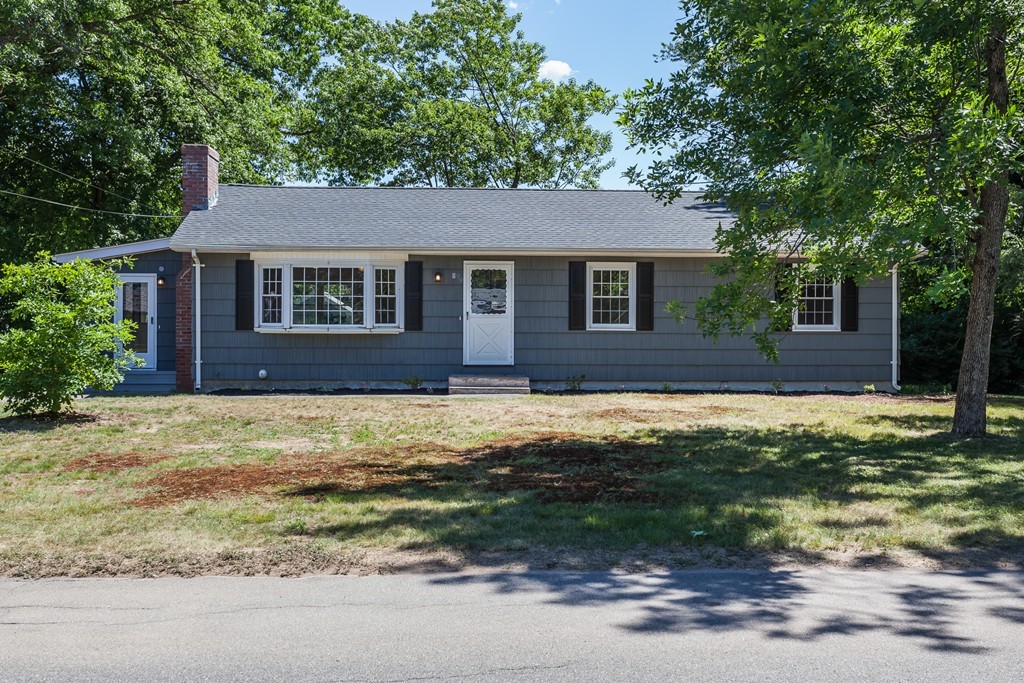99 Sunnybrook Road Springfield, MA 01119 - Photo 24 of 30 a front view of a house with a yard