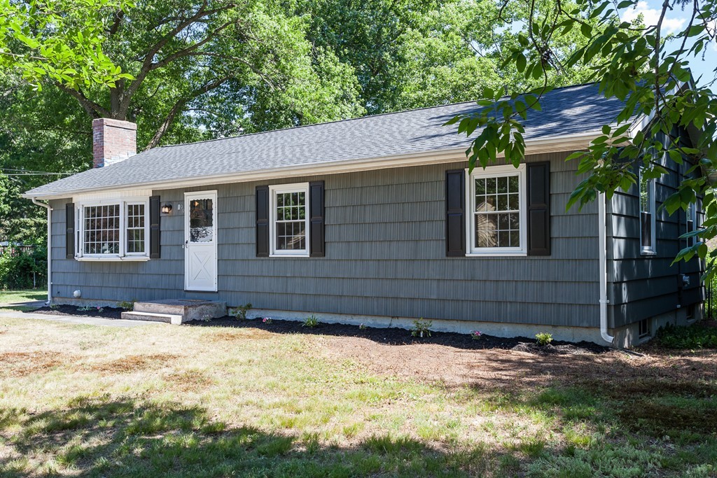 99 Sunnybrook Road Springfield, MA 01119 - Photo 25 of 30 a front view of a house with a yard