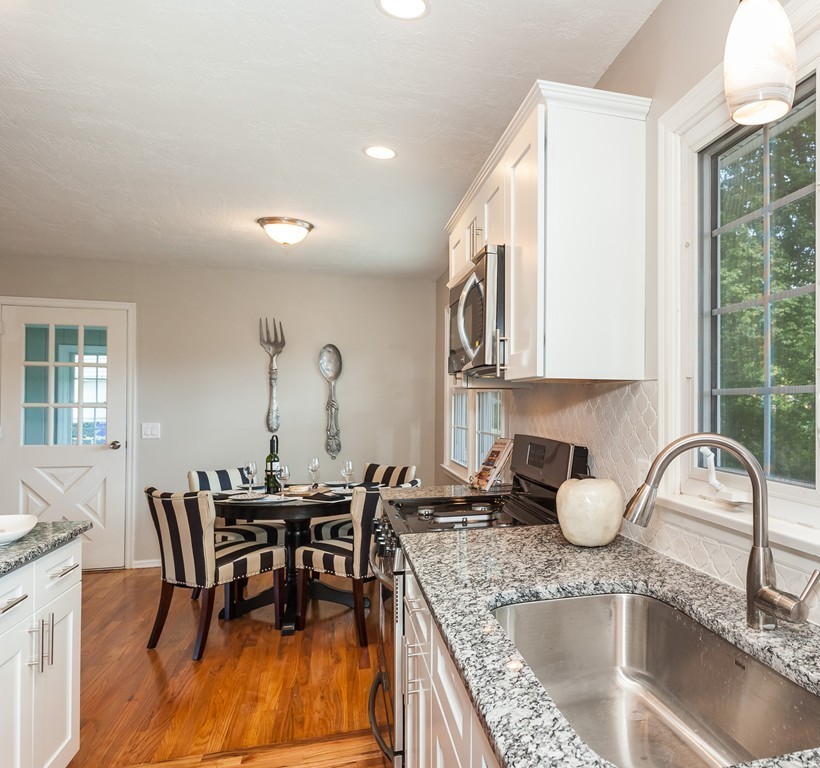 99 Sunnybrook Road Springfield, MA 01119 - Photo 5 of 30 a kitchen with granite countertop a sink and appliances