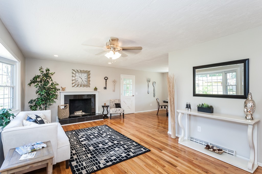 99 Sunnybrook Road Springfield, MA 01119 - Photo 8 of 30 a living room with furniture and a fireplace