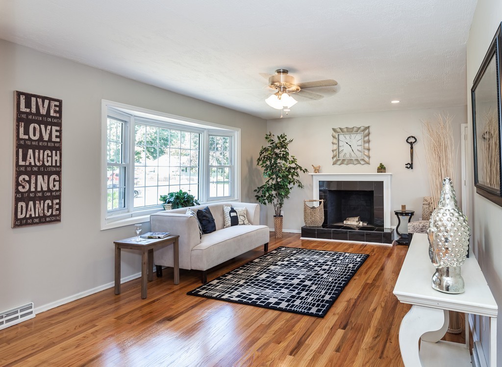 99 Sunnybrook Road Springfield, MA 01119 - Photo 9 of 30 a living room with furniture and a fireplace