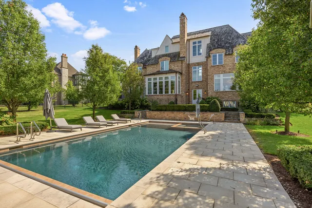 a view of a patio with a yard