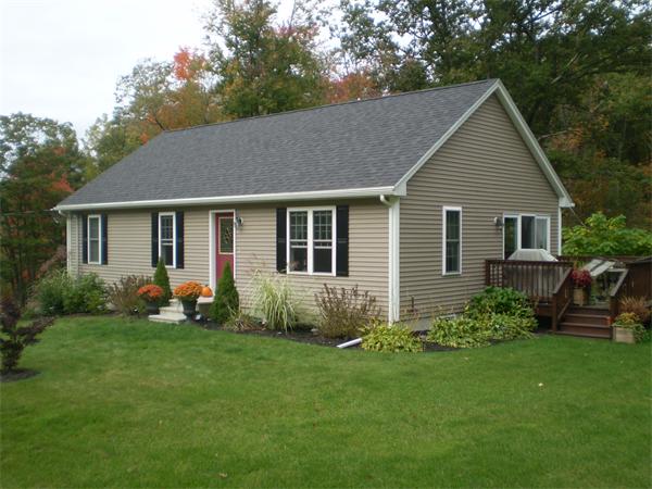 18 Barre Paxton Road Rutland, MA 01543 - Photo 1 of 17 a view of a house with a yard and garden