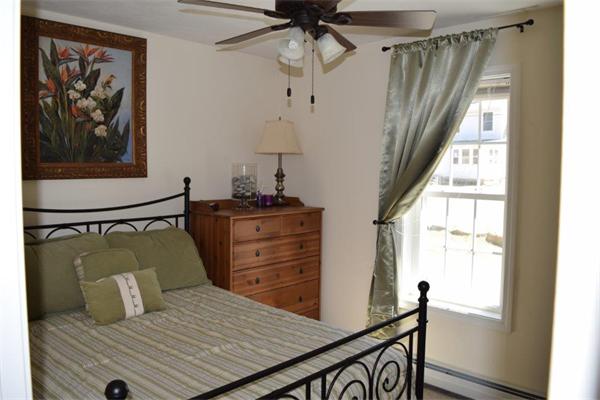 18 Barre Paxton Road Rutland, MA 01543 - Photo 11 of 17 a bedroom with a bed and a window