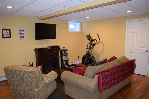 18 Barre Paxton Road Rutland, MA 01543 - Photo 15 of 17 a living room with furniture and a flat screen tv