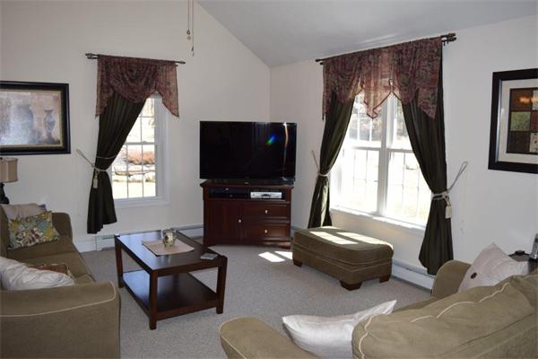 18 Barre Paxton Road Rutland, MA 01543 - Photo 5 of 17 a living room with furniture and a flat screen tv