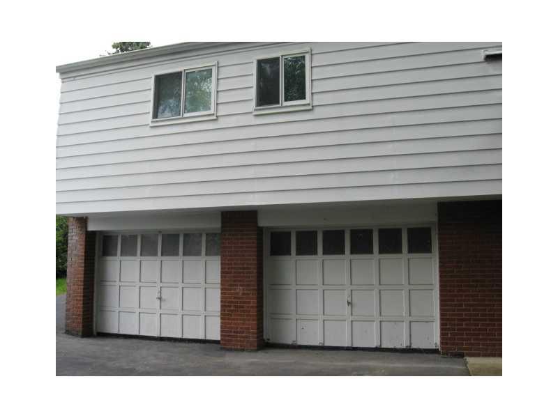 2406 Haymaker Road Monroeville, PA 15146 - Photo 18 of 25 Exterior Back. Two car garage in rear of home with turn around