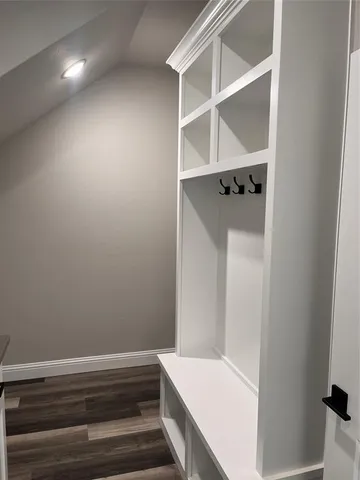 a view of an empty walk in closet