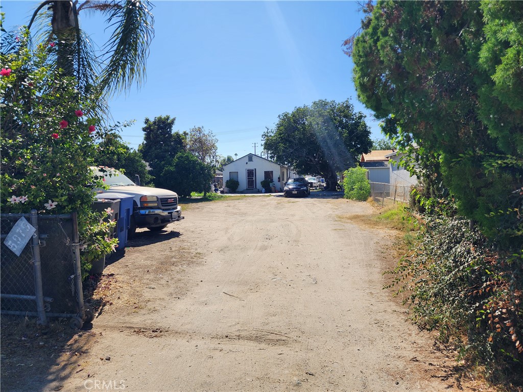 5875-5875 Picker Street Riverside, CA 92503 - Photo 2 of 2 a white house that has a tree in front of it