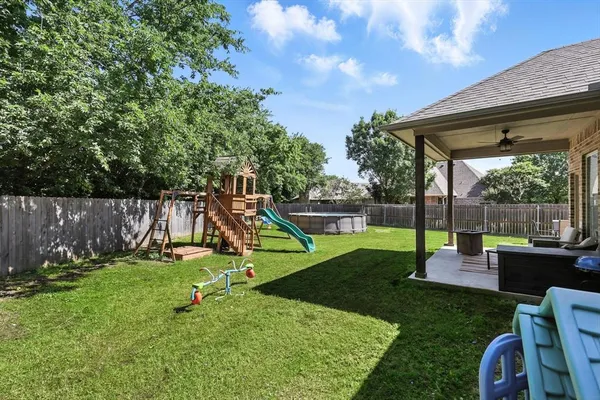 a view of a garden with a slide