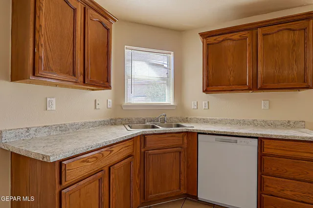 a view of a big room with closet and ceiling fan