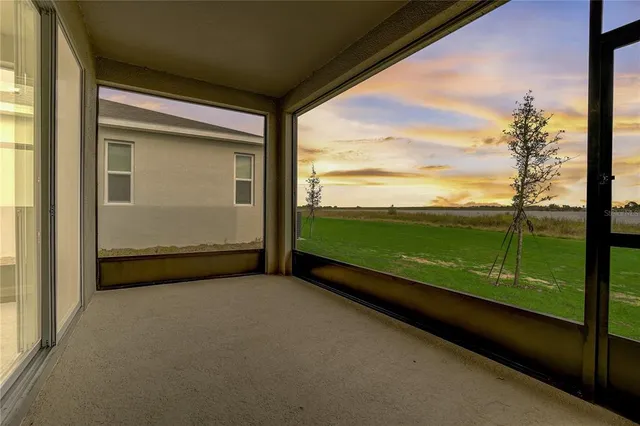 a view of a room with mountain view from a window