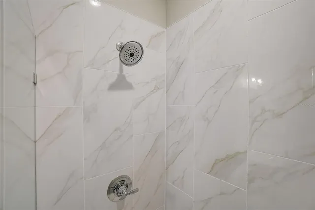 a view of a bathroom from the hallway