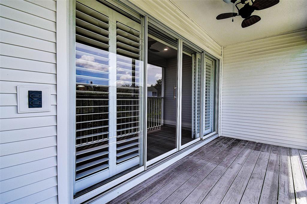 14865 Seminole Trail Seminole, FL 33776 - Photo 21 of 54 a view of a balcony with wooden floor