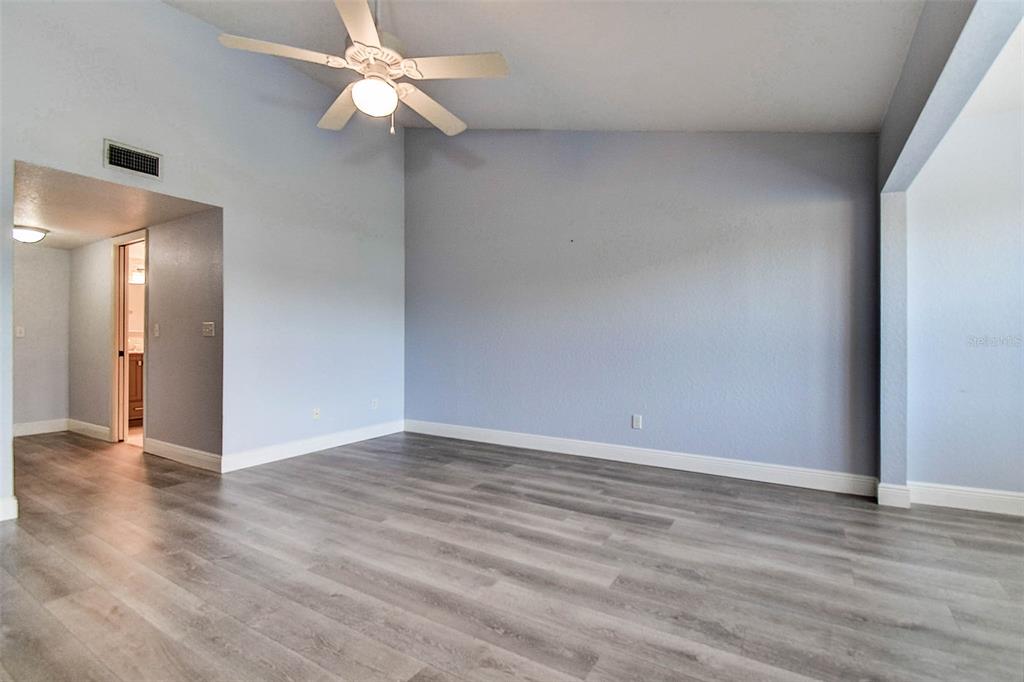 14865 Seminole Trail Seminole, FL 33776 - Photo 30 of 54 a view of an empty room with wooden floor