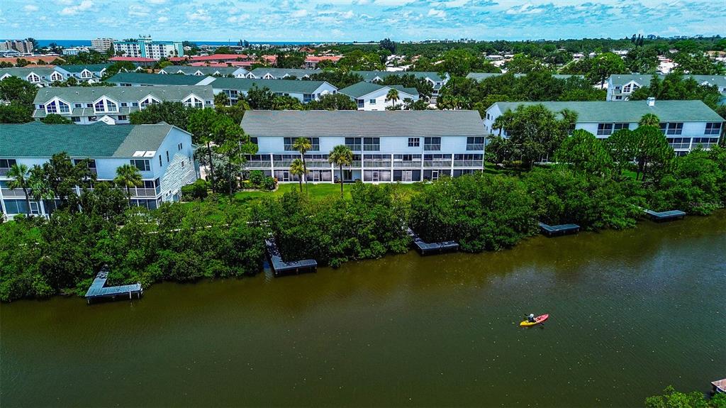 14865 Seminole Trail Seminole, FL 33776 - Photo 4 of 54 an aerial view of a house with a lake view