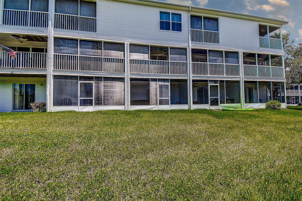 14865 Seminole Trail Seminole, FL 33776 - Photo 47 of 54 a large building with a yard