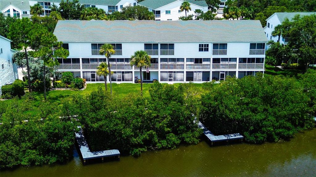14865 Seminole Trail Seminole, FL 33776 - Photo 5 of 54 an aerial view of a house with swimming pool and garden view