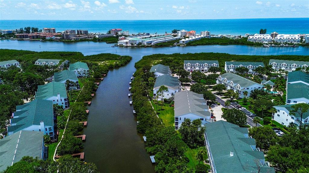 14865 Seminole Trail Seminole, FL 33776 - Photo 8 of 54 an aerial view of residential houses with outdoor space and lake view