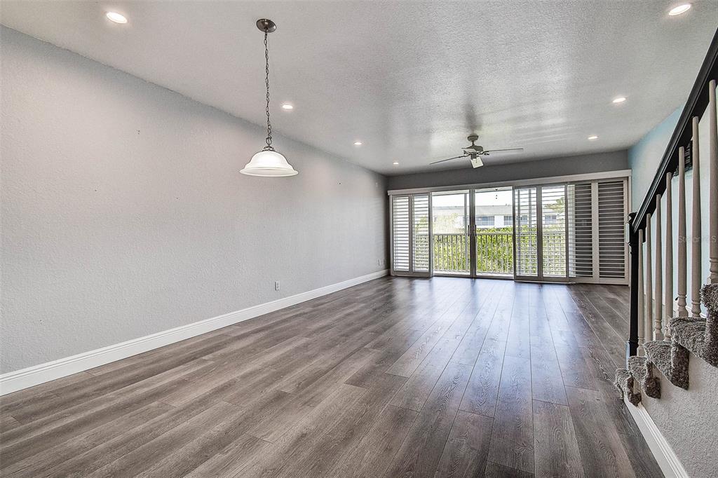 14865 Seminole Trail Seminole, FL 33776 - Photo 10 of 54 a view of a room with wooden floor and large window