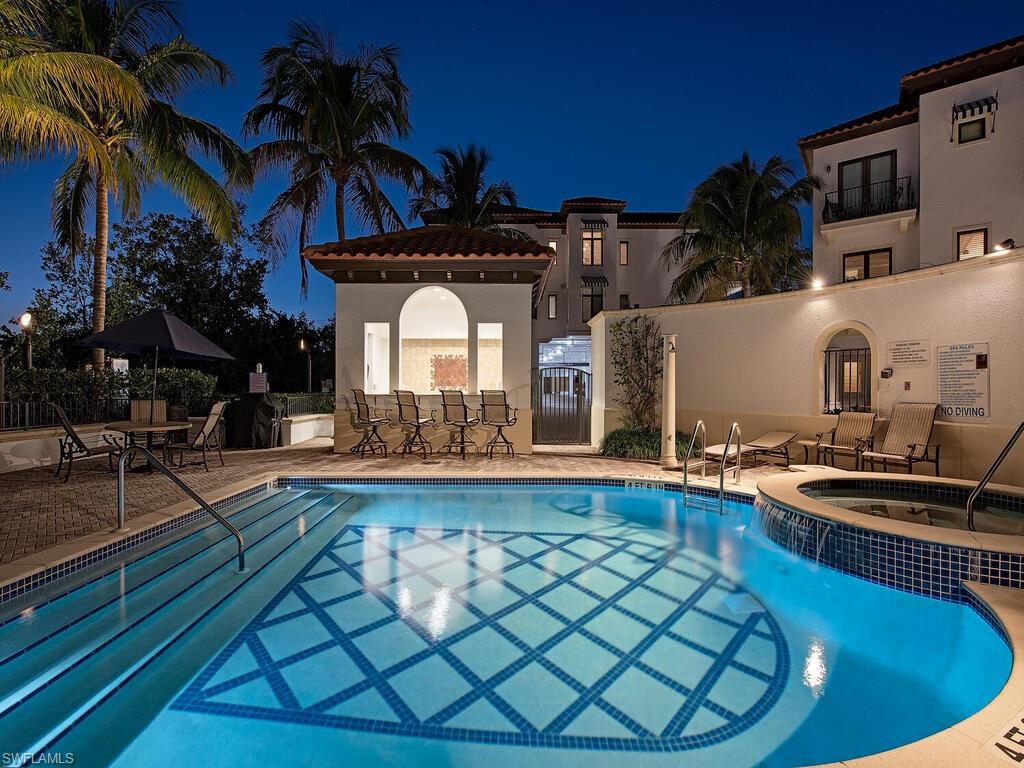 1530 5th Avenue South, Unit C206 Naples, FL 34102 - Photo 16 of 16 a view of a house with backyard and sitting area