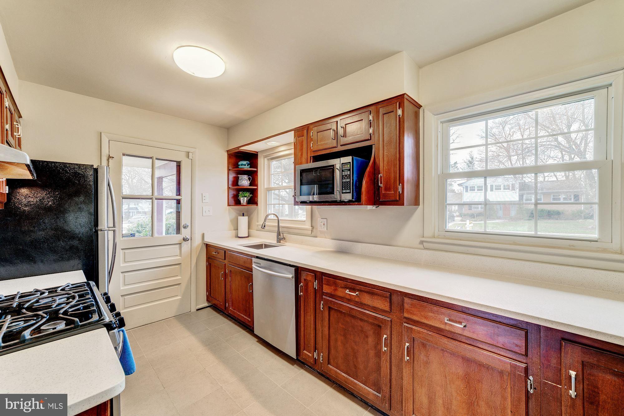 8403 Wagon Wheel Road Alexandria, VA 22309 - Photo 11 of 47 Stainless appliances and side door to carport