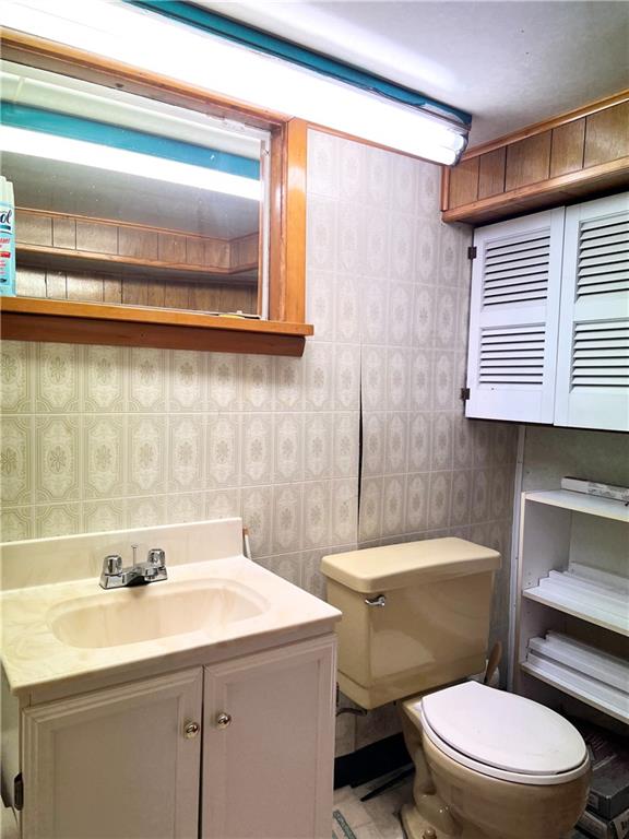 1673 Hancock Avenue Apollo, PA 15613 - Photo 22 of 30 a bathroom with a sink a toilet and mirror