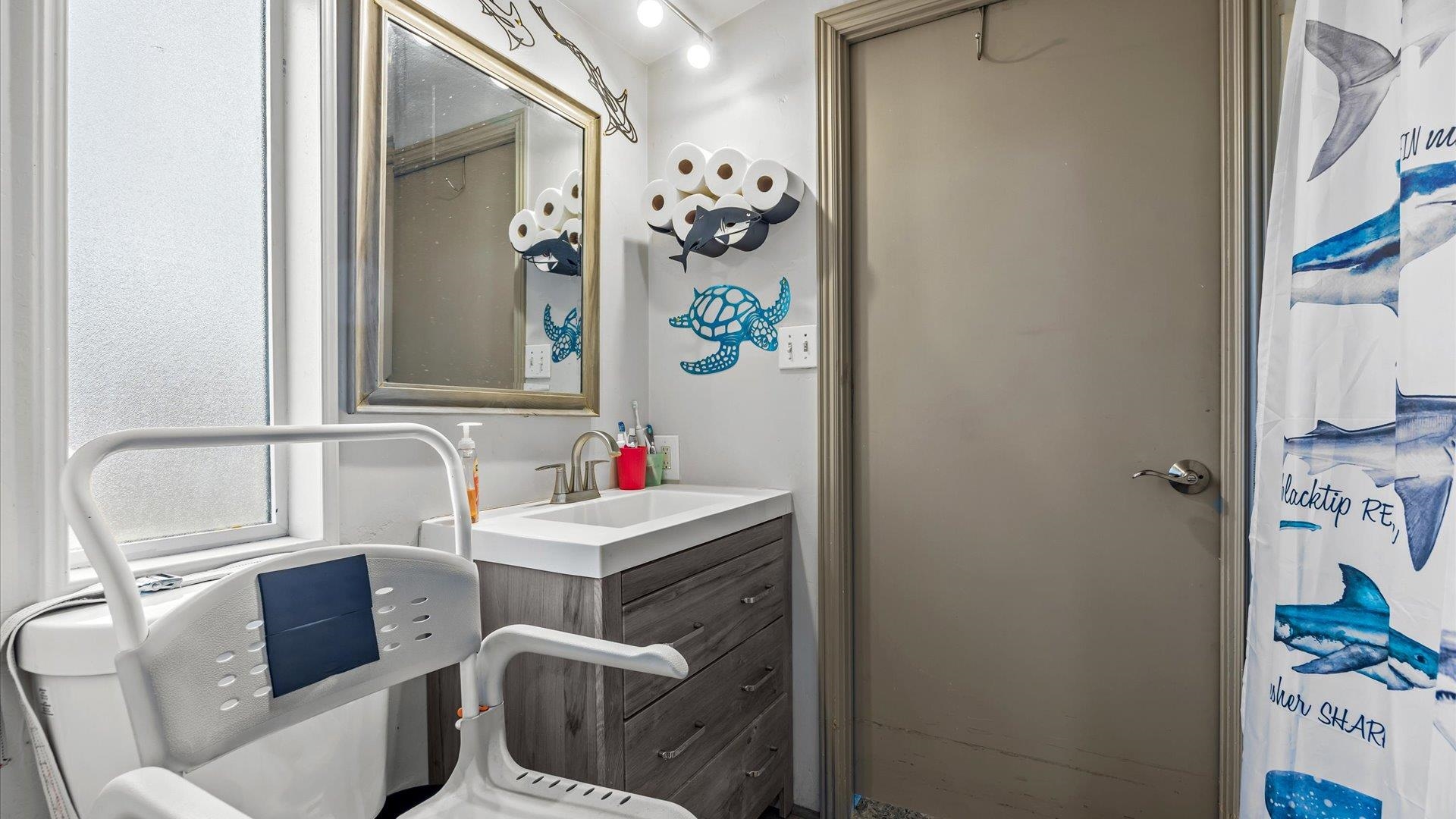 3216 E Road Clifton, CO 81520 - Photo 18 of 33 a bathroom with a sink toilet and mirror