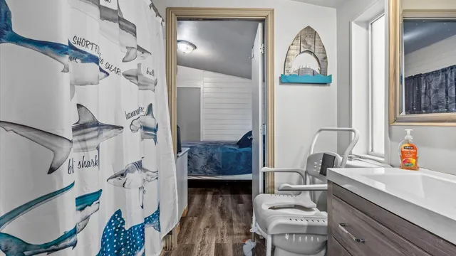 a bedroom with a bed and furniture