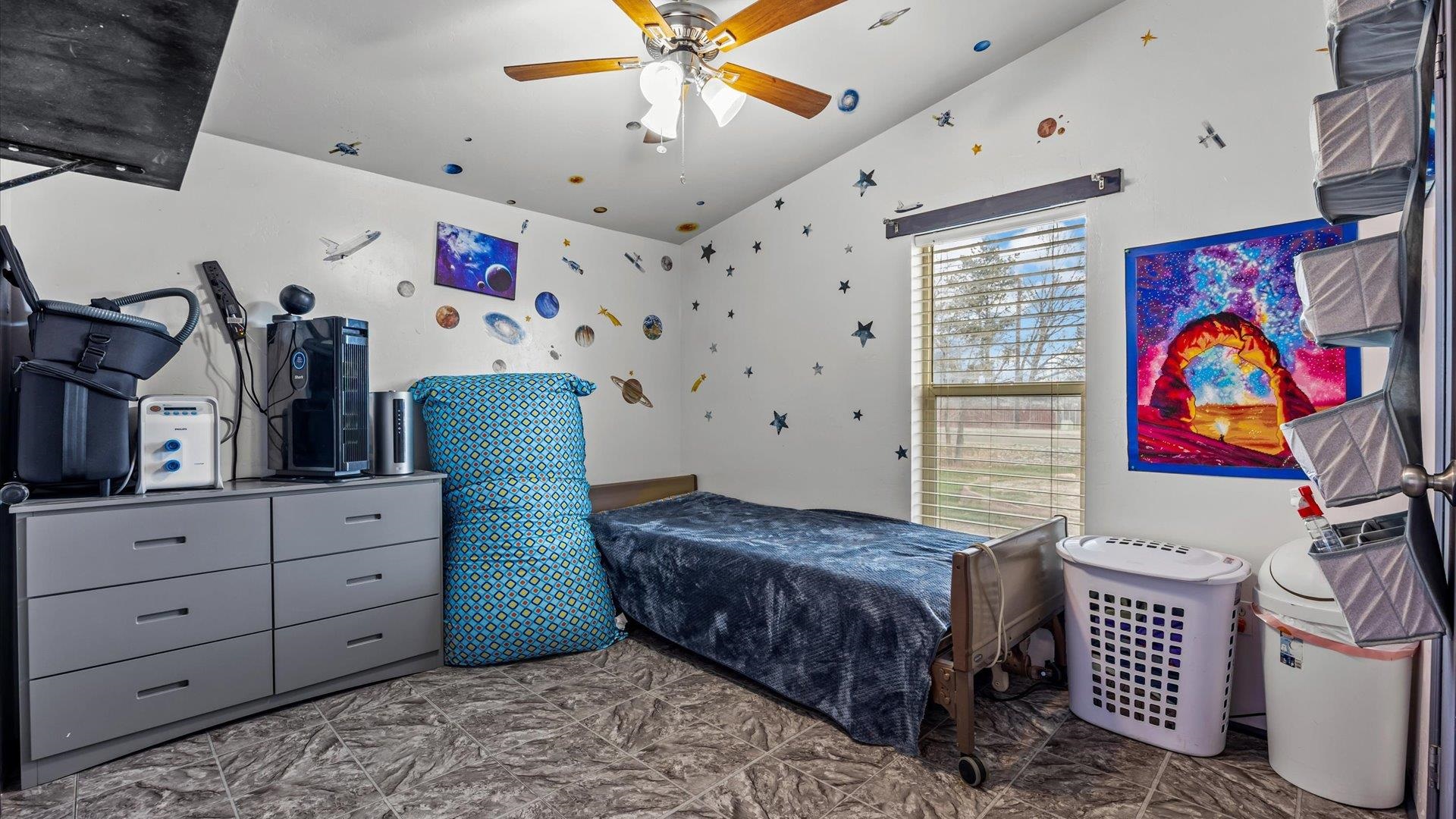 3216 E Road Clifton, CO 81520 - Photo 20 of 33 a bedroom with a bed and furniture