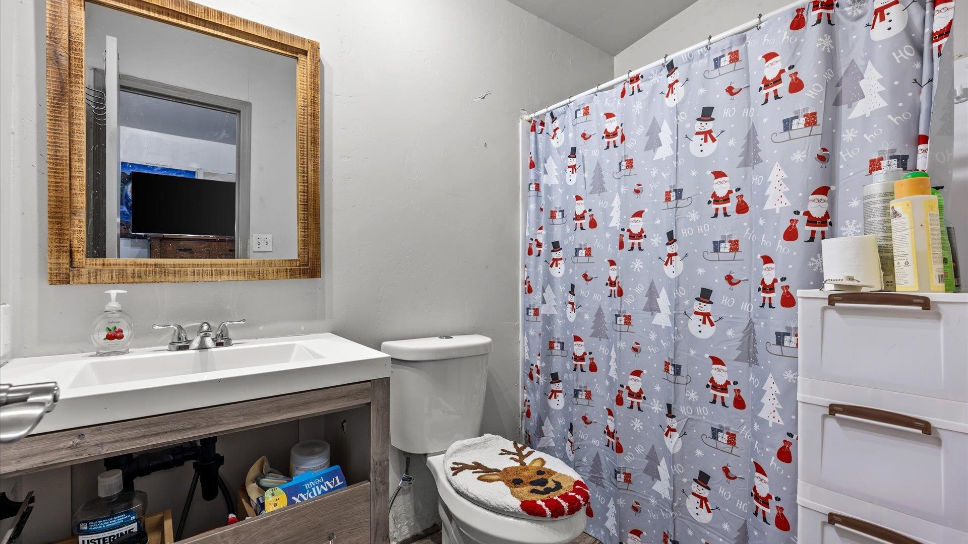 3216 E Road Clifton, CO 81520 - Photo 23 of 33 a bathroom with a sink and a mirror