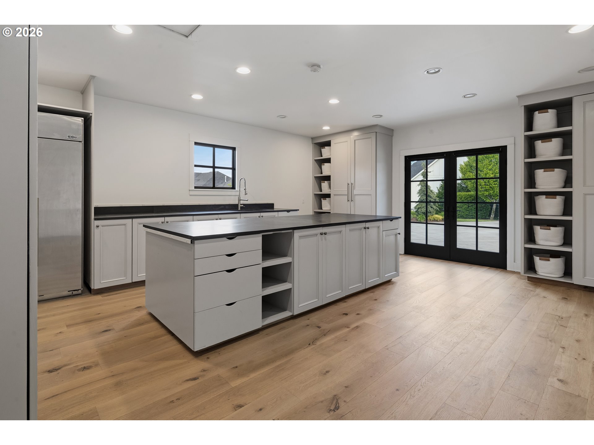 554 Northwest Dawson Ridge Drive Camas, WA 98607 - Photo 30 of 48 a kitchen with stainless steel appliances granite countertop a stove and a refrigerator
