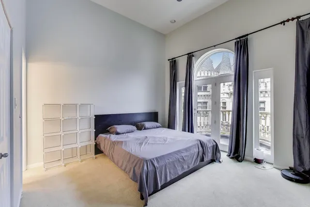 a view of a white building among the street