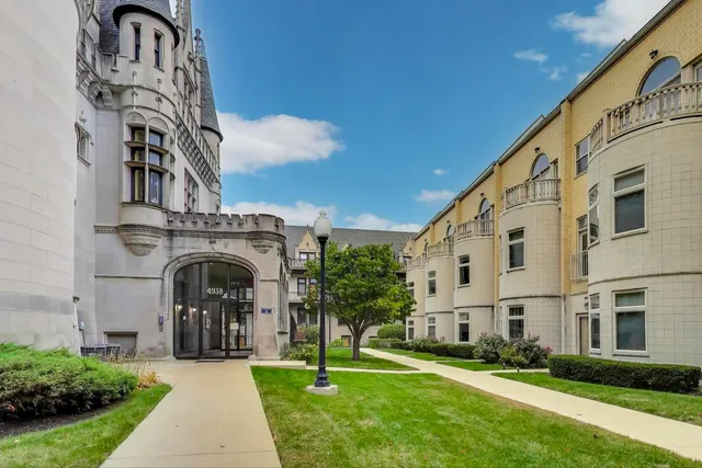 a bedroom with a bed and a table