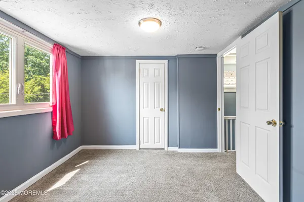 a view of empty room with window