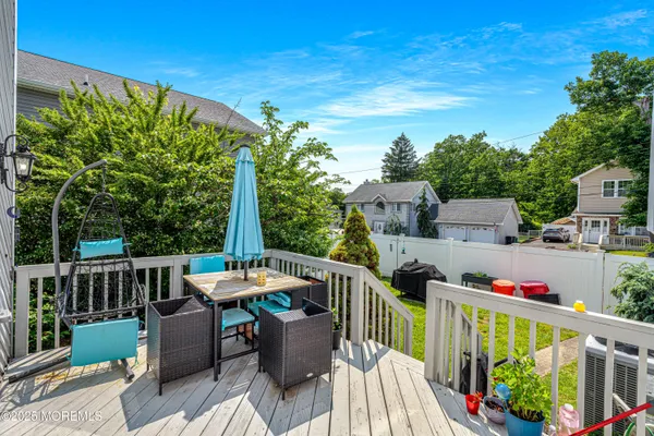 a view of a patio on the roof deck