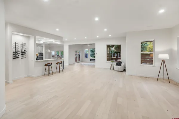 a kitchen with a sink and large window