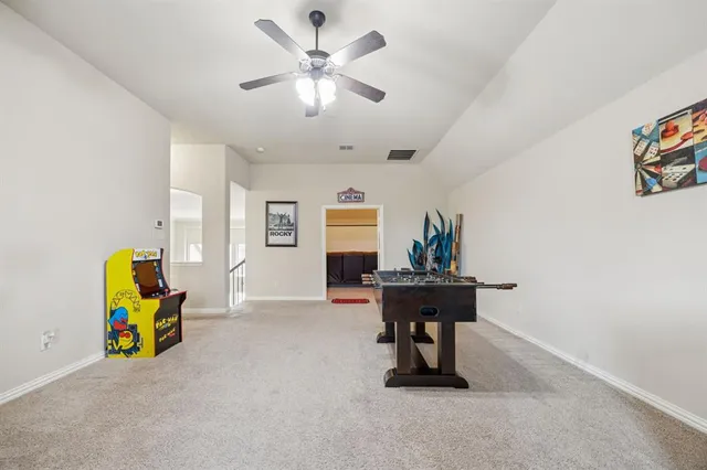 a view of a workspace with furniture