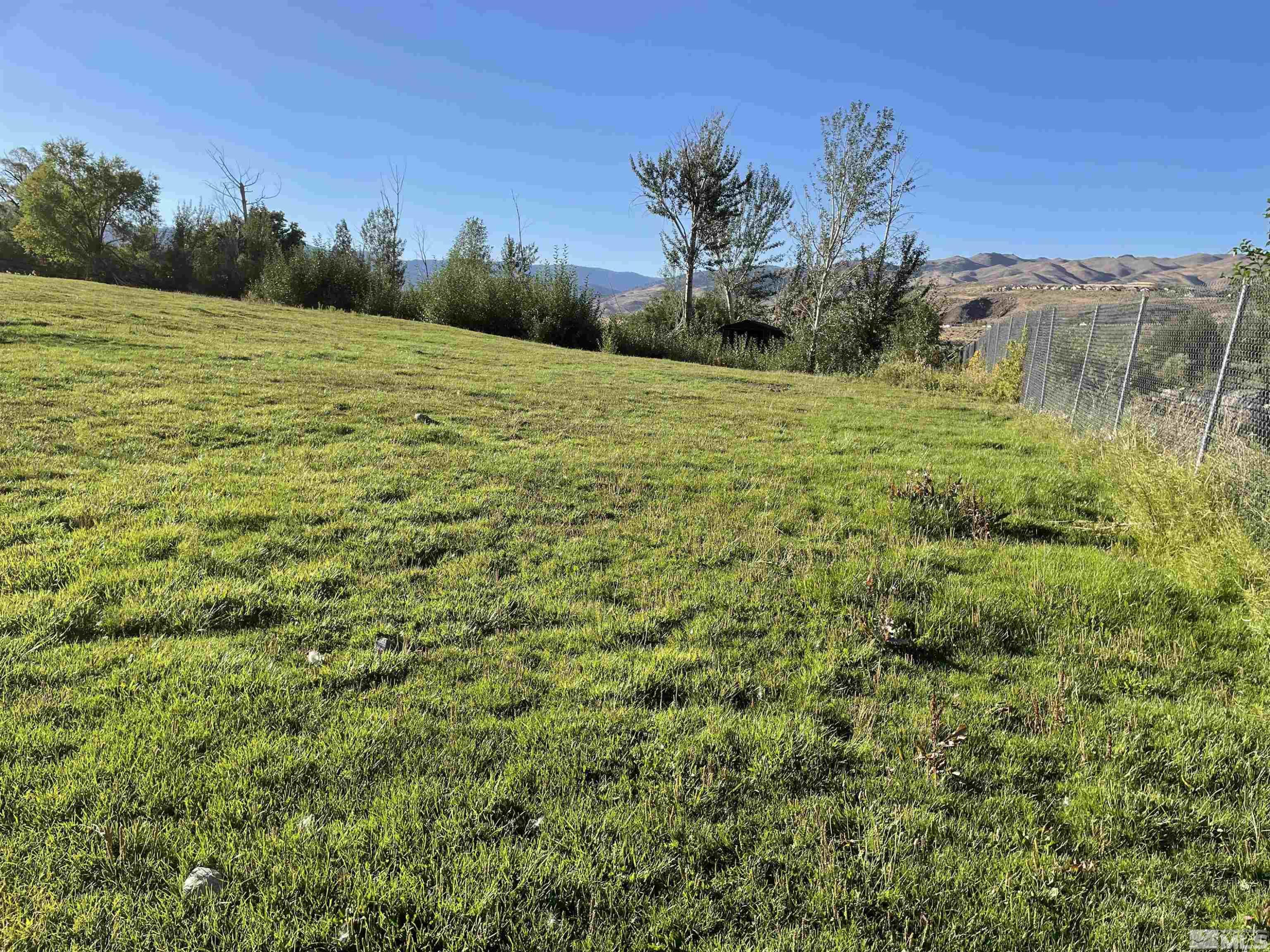 0 Mario Road Reno, NV 89523 - Photo 23 of 29 a view of a field with an ocean